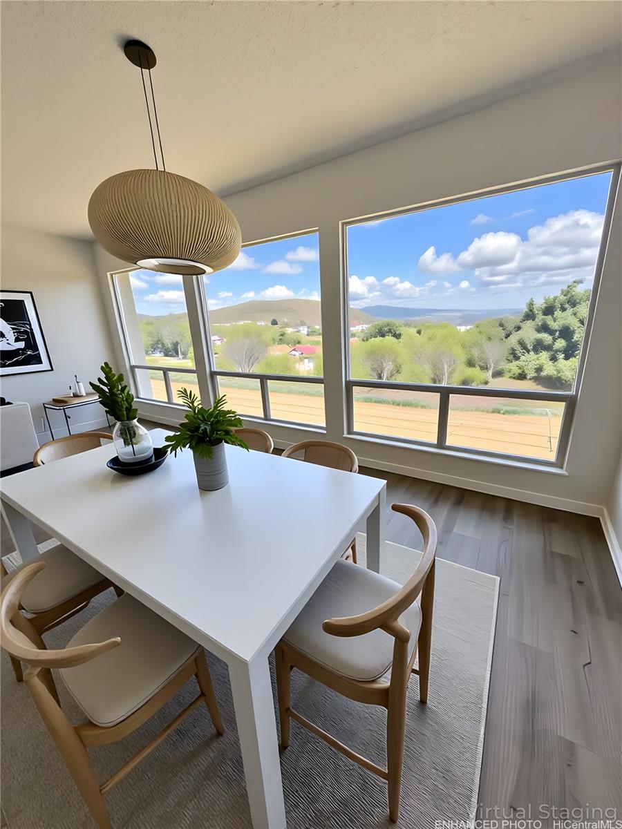 92-993 Makakilo Drive, Unit 45 Kapolei, HI 96707 - Photo 4 of 15 a view of a dining room with furniture window and outside view