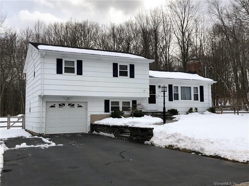 270 Deerfield Road Hamden, CT 06518 - Photo 1 of 1 a front view of a house with a yard