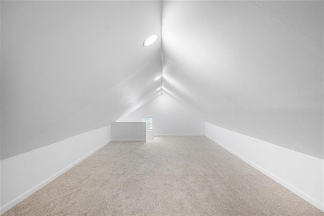 2412 Clearview Road Coplay, PA 18037 - Photo 25 of 53 Angled ceilings and soft carpeting define this finished attic space illuminated by overhead skylights.