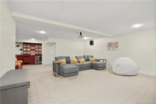 a living room with furniture and a couch