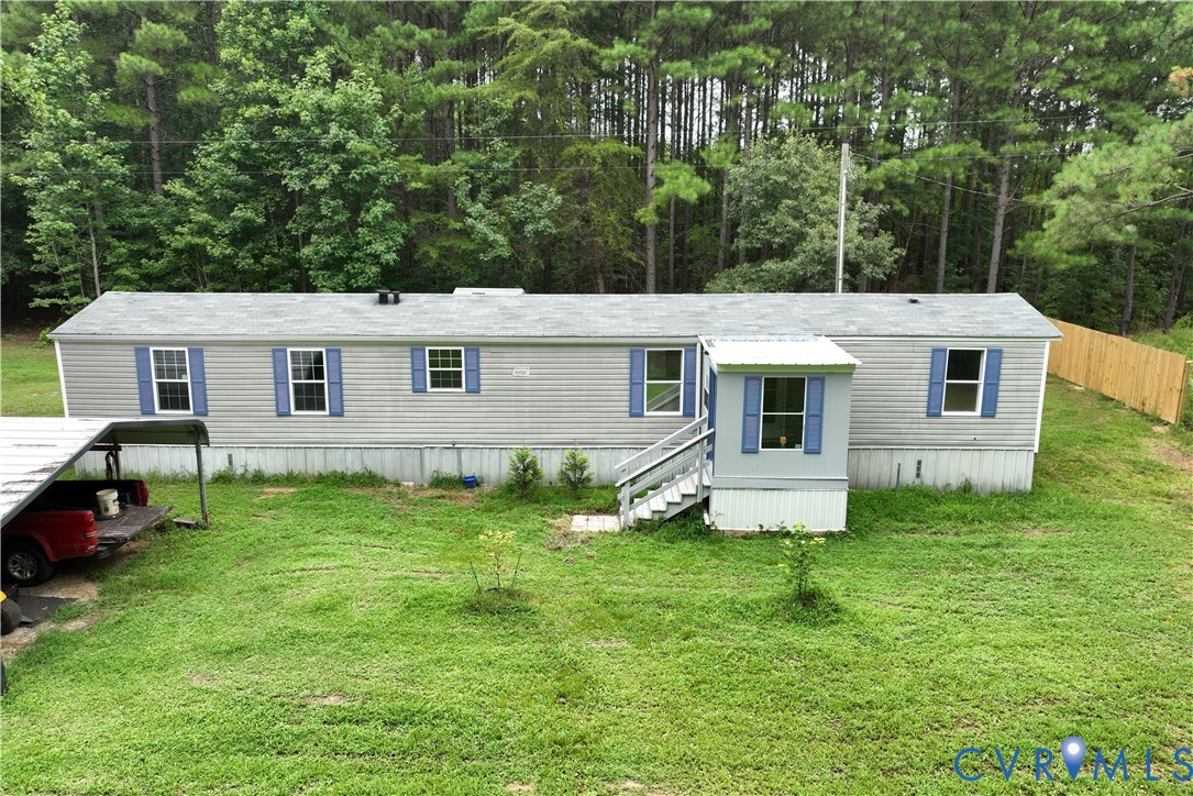 3114 Sheltons Road Drakes Branch, VA 23937 - Photo 1 of 20 a view of a house with a backyard