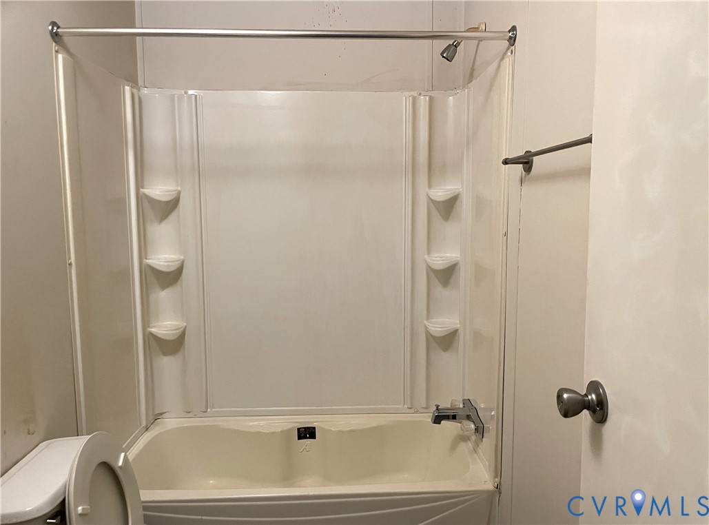 3114 Sheltons Road Drakes Branch, VA 23937 - Photo 11 of 20 a bathroom with a tub and a shower