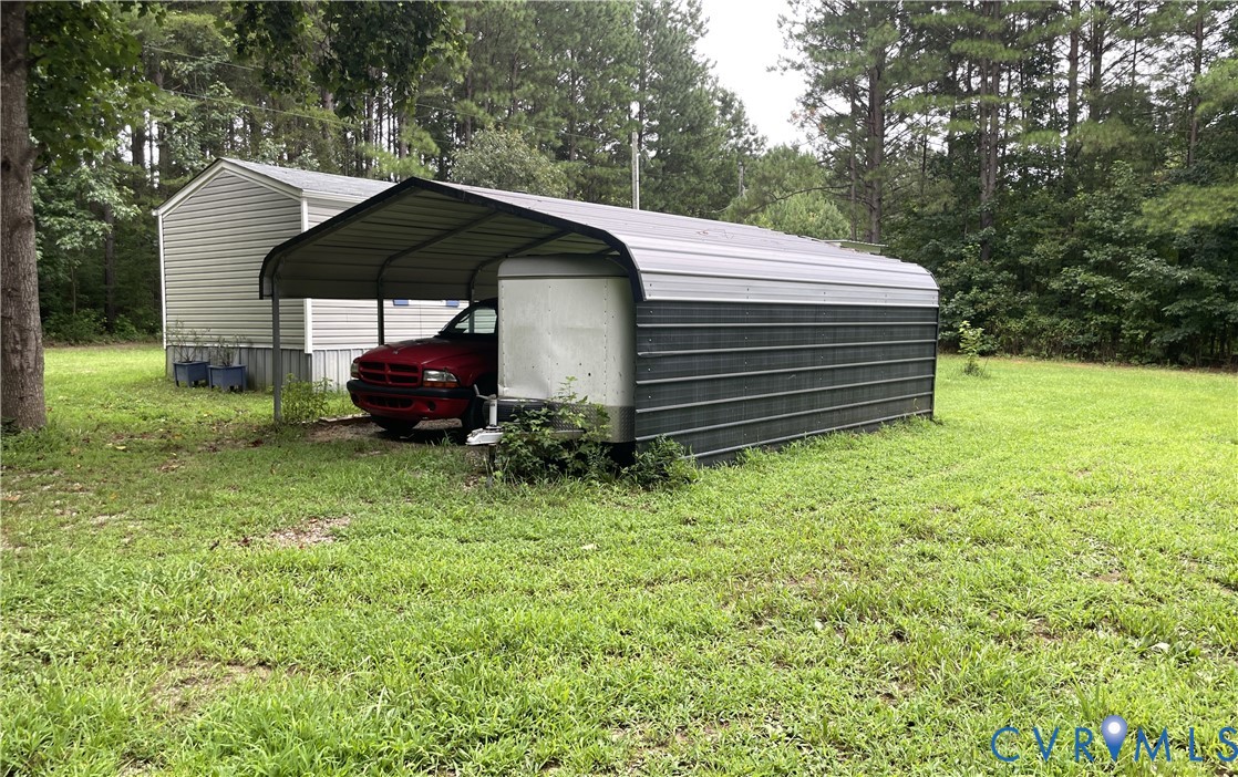3114 Sheltons Road Drakes Branch, VA 23937 - Photo 16 of 20 a view of backyard with a garden and entertaining space