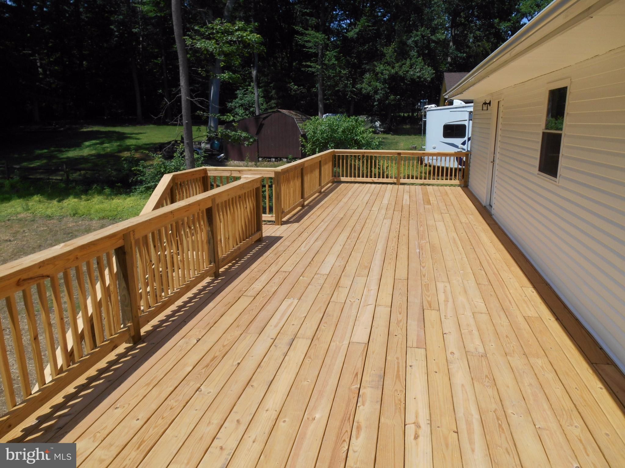 30 Colonial Circle North East, MD 21901 - Photo 2 of 4 a view of balcony with wooden floor and outdoor seating
