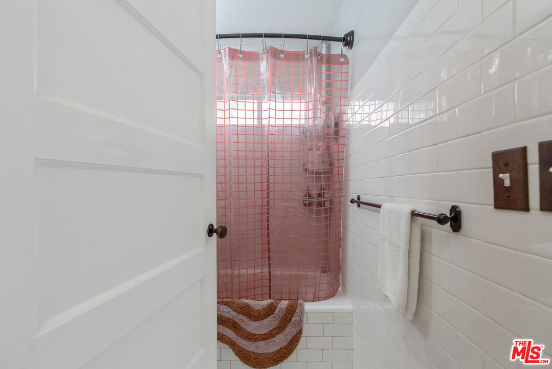 1767 Locust Street Pasadena, CA 91106 - Photo 12 of 28 a bathroom with a shower