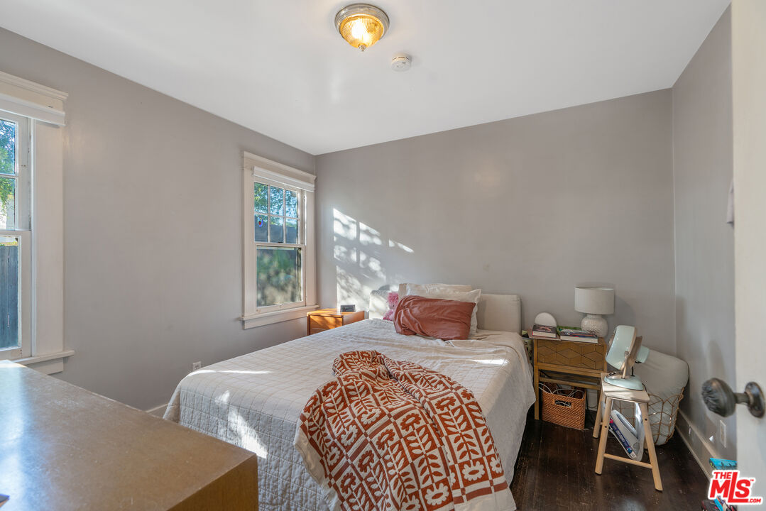 1767 Locust Street Pasadena, CA 91106 - Photo 15 of 28 a bedroom with a bed and window