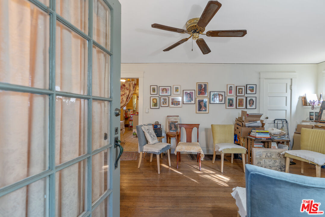 1767 Locust Street Pasadena, CA 91106 - Photo 17 of 28 a living room with furniture wooden floor and a window
