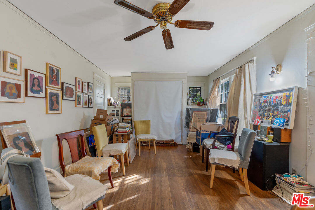 1767 Locust Street Pasadena, CA 91106 - Photo 18 of 28 a living room with furniture and a flat screen tv