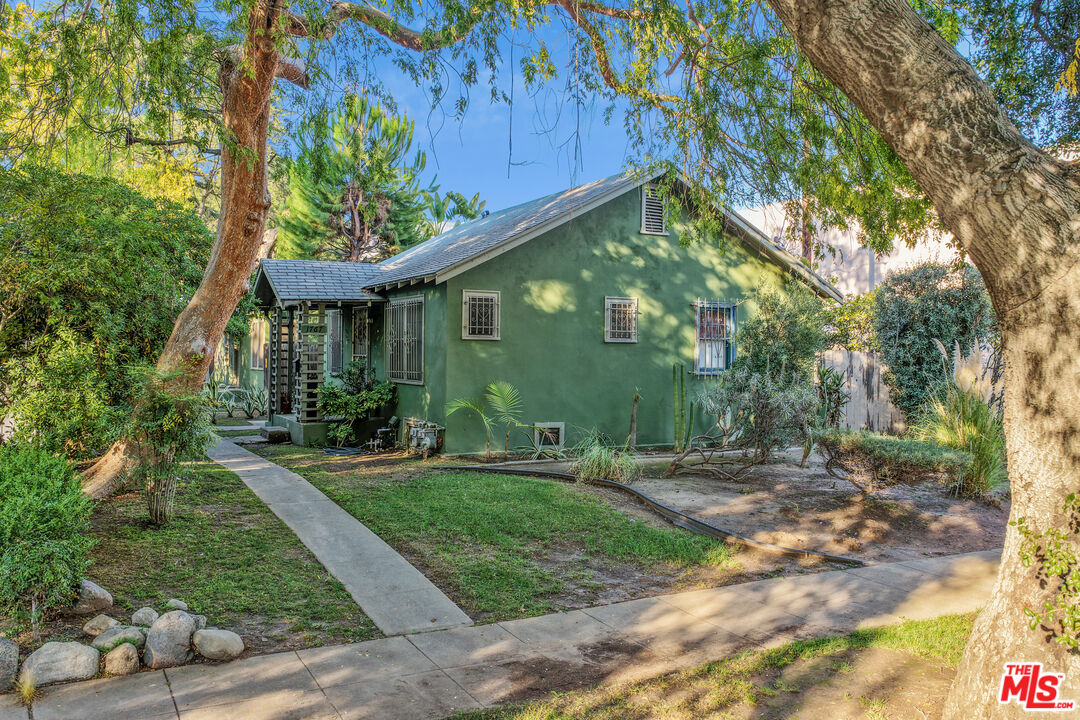 1767 Locust Street Pasadena, CA 91106 - Photo 2 of 28 a front view of a house with yard