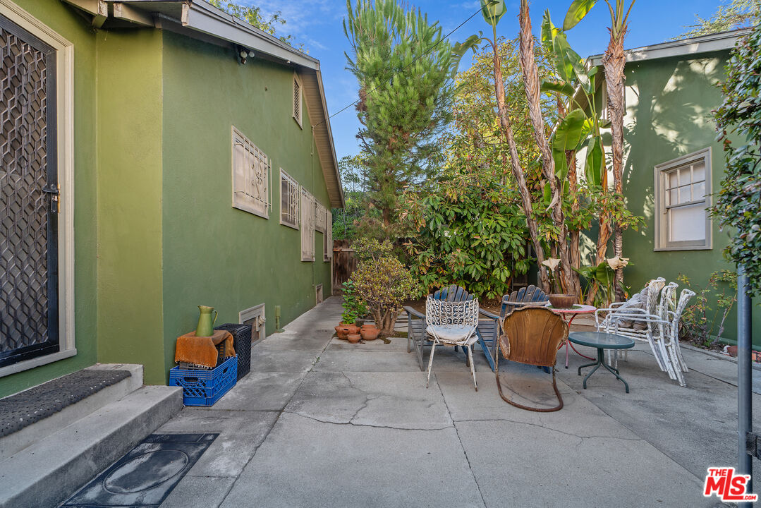1767 Locust Street Pasadena, CA 91106 - Photo 21 of 28 a backyard of a house with outdoor seating