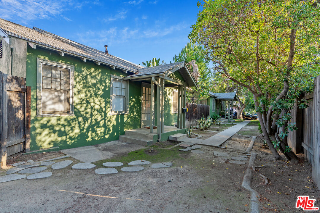1767 Locust Street Pasadena, CA 91106 - Photo 25 of 28 a front view of a house with garden
