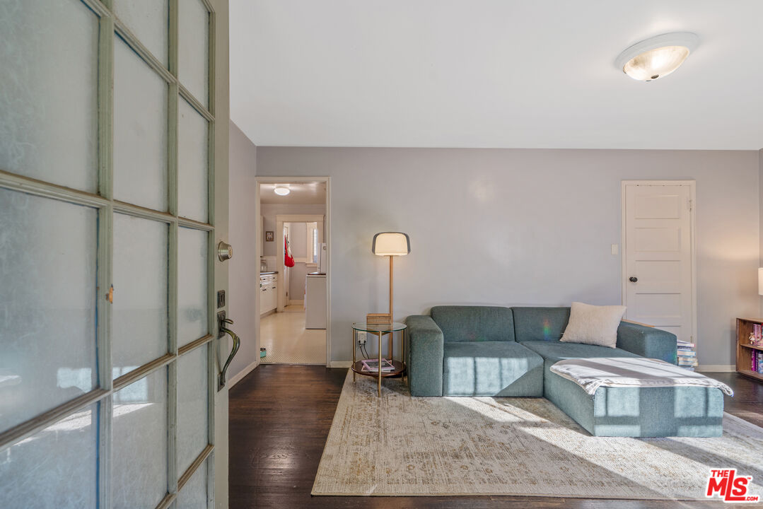 1767 Locust Street Pasadena, CA 91106 - Photo 5 of 28 a living room with furniture and a wooden floor
