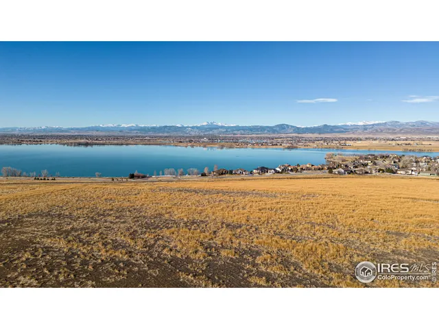 a view of an ocean and mountain