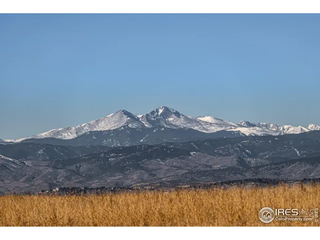 a view of mountain with sunset