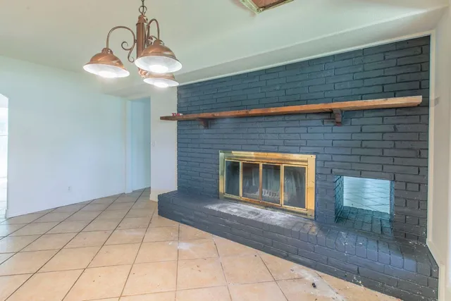 a view of a livingroom with a fireplace