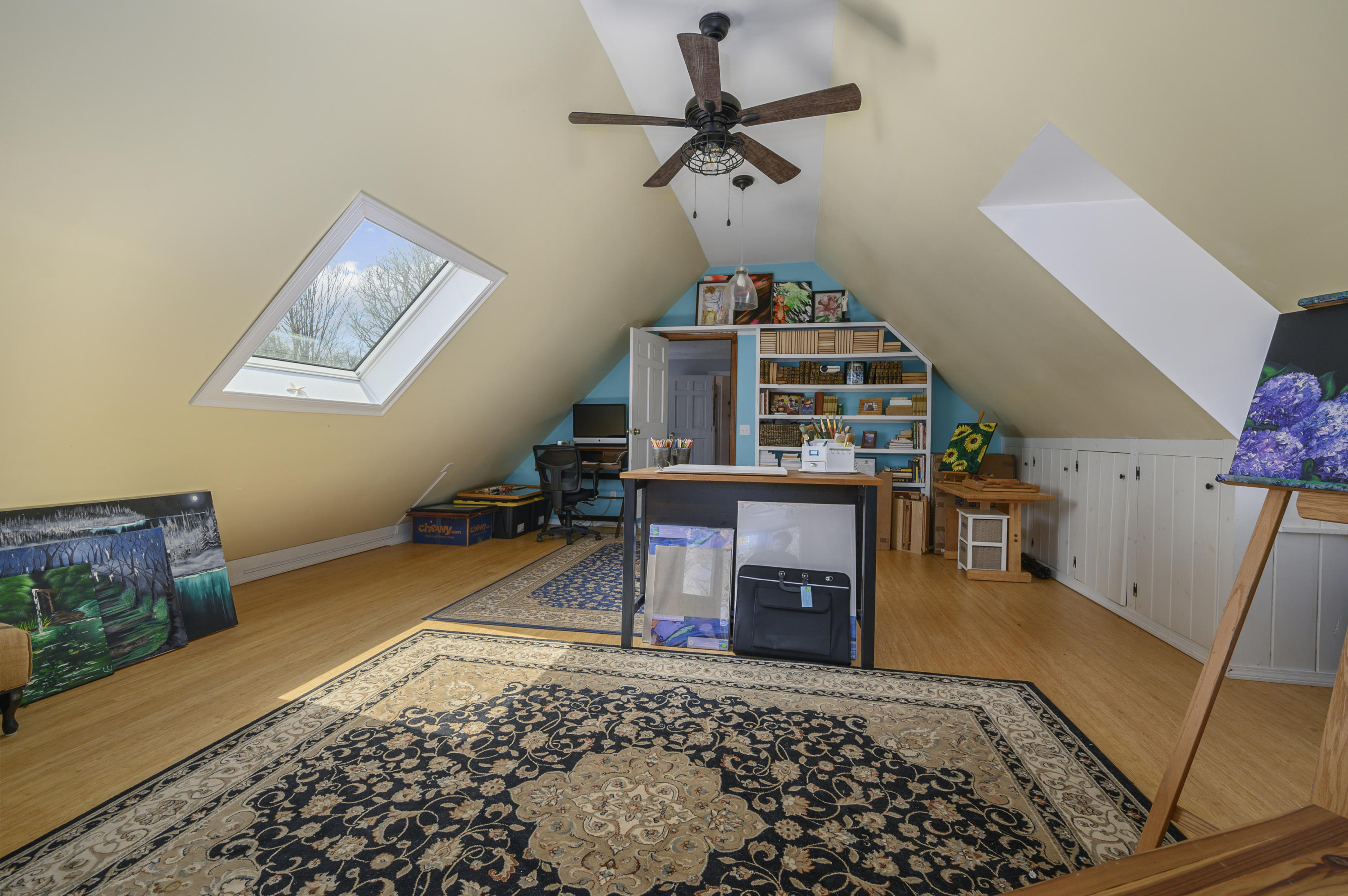 29 Old Kings Road Cotuit, MA 02635 - Photo 29 of 30 a living room with a couch and a potted plant