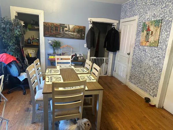 a workspace with furniture and wooden floor