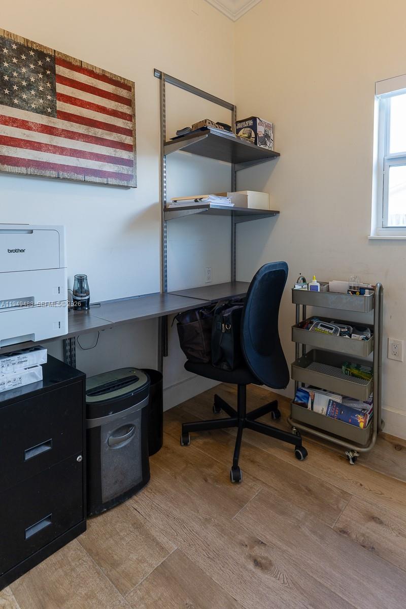 16141 Southwest 156th Avenue Miami, FL 33187 - Photo 28 of 35 a kitchen with a stove and a wooden floor