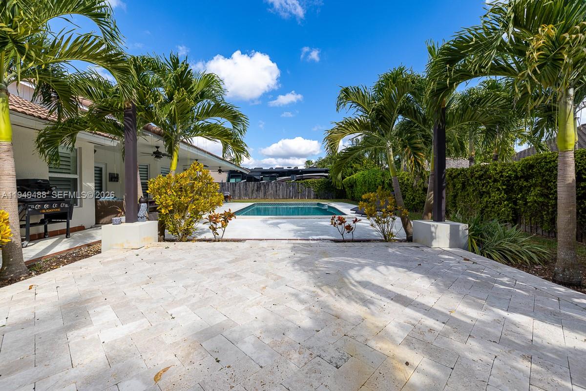 16141 Southwest 156th Avenue Miami, FL 33187 - Photo 34 of 35 a view of a backyard with a fountain