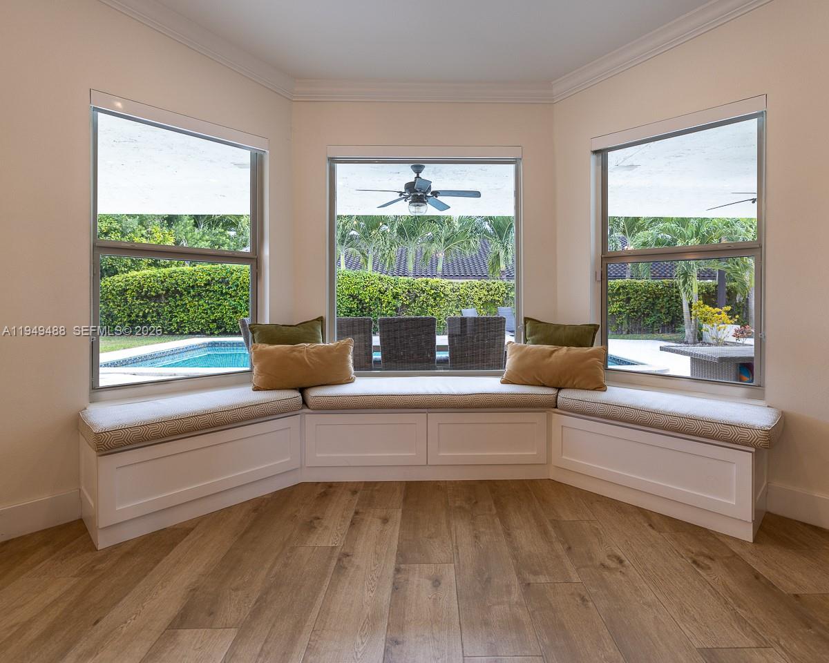 16141 Southwest 156th Avenue Miami, FL 33187 - Photo 7 of 35 a living room with a large window bed and outer view