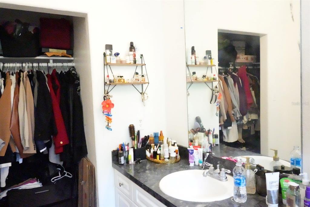 7040 Lumberton Road Zephyrhills, FL 33540 - Photo 17 of 34 a view of a walk in closet