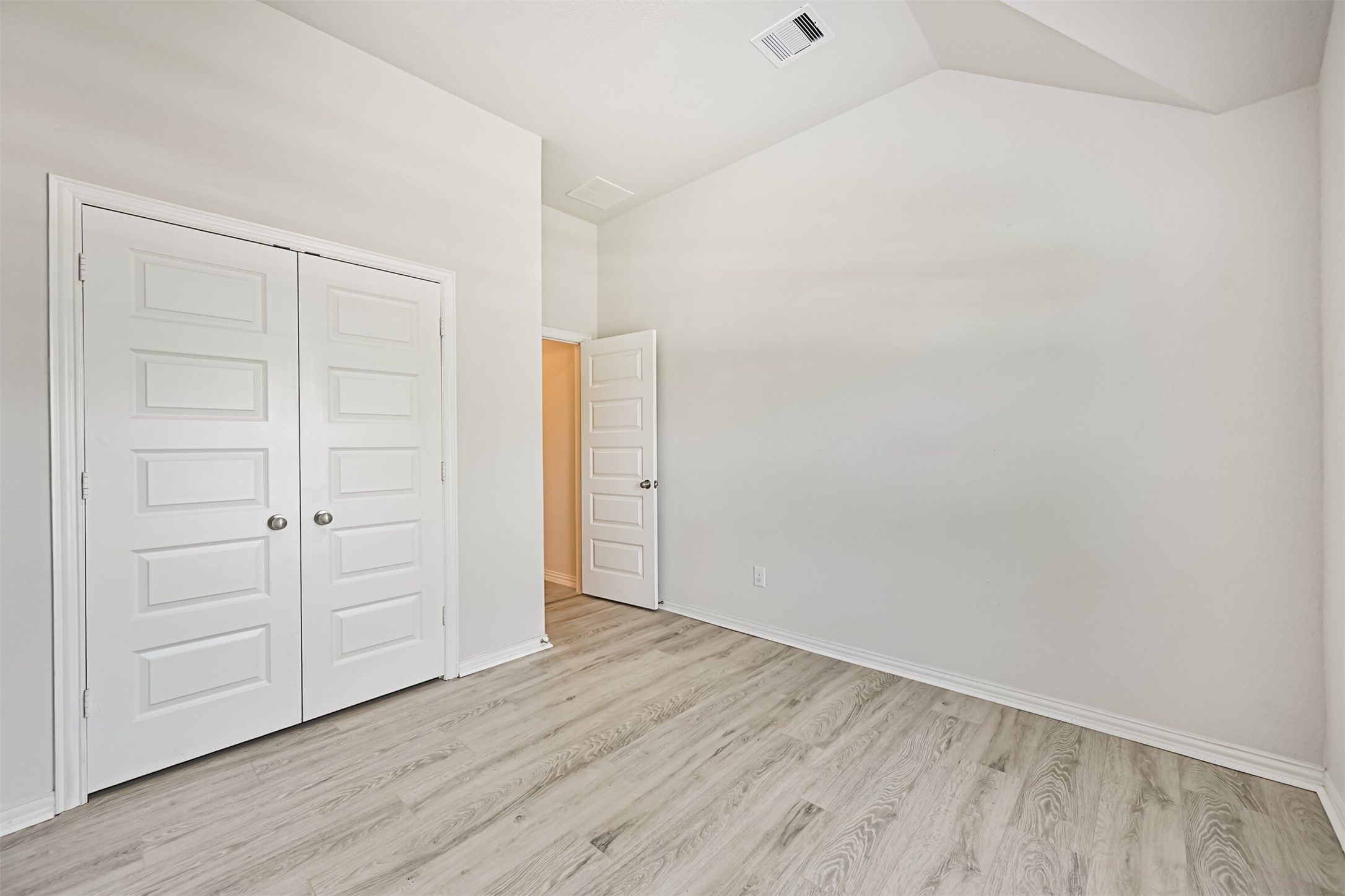 7019 Terra Drive Manvel, TX 77578 - Photo 11 of 41 an empty room with wooden floor