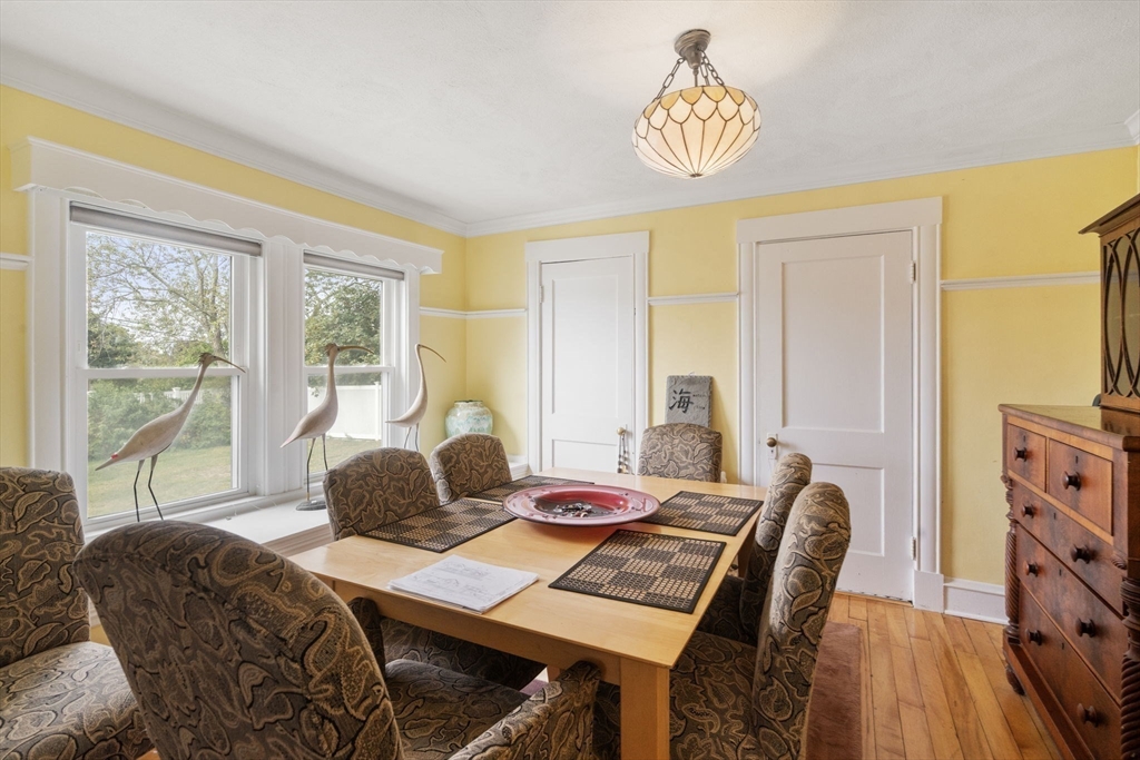 68 Edgewater Road Hull, MA 02045 - Photo 11 of 39 a living room with furniture and a window