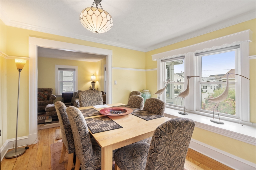 68 Edgewater Road Hull, MA 02045 - Photo 12 of 39 a view of a dining room with furniture