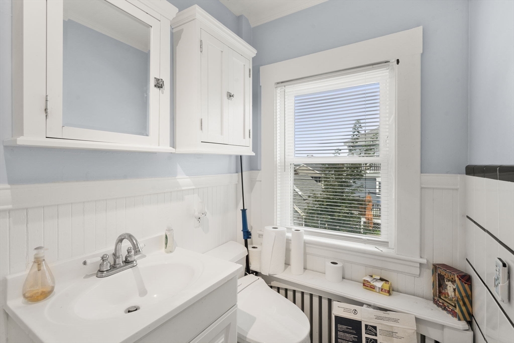 68 Edgewater Road Hull, MA 02045 - Photo 13 of 39 a bathroom with a sink and a bathtub