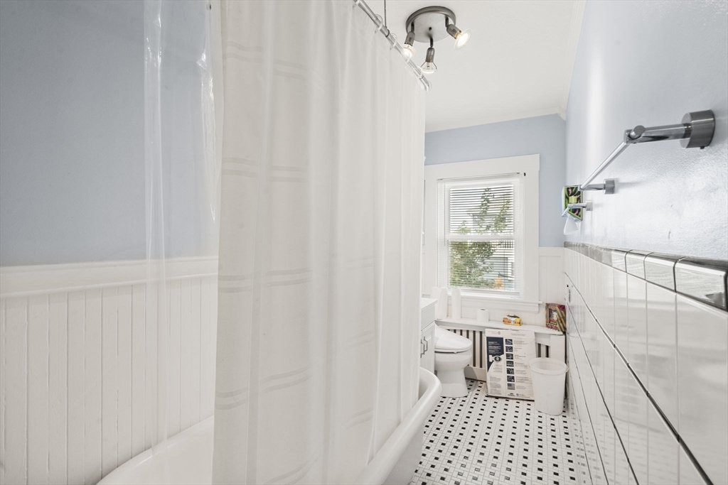 68 Edgewater Road Hull, MA 02045 - Photo 20 of 39 a view of a bedroom with furniture and window