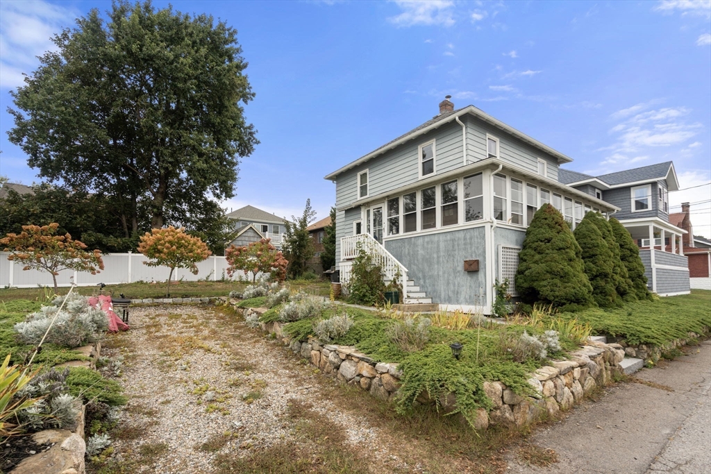 68 Edgewater Road Hull, MA 02045 - Photo 26 of 39 a view of a house with a yard
