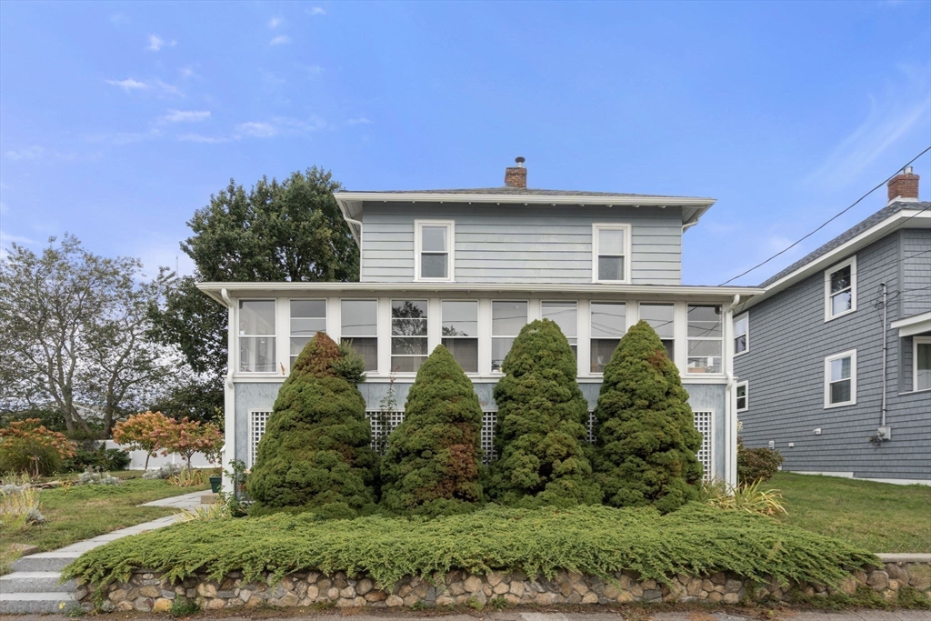 68 Edgewater Road Hull, MA 02045 - Photo 3 of 39 a front view of a house with garden