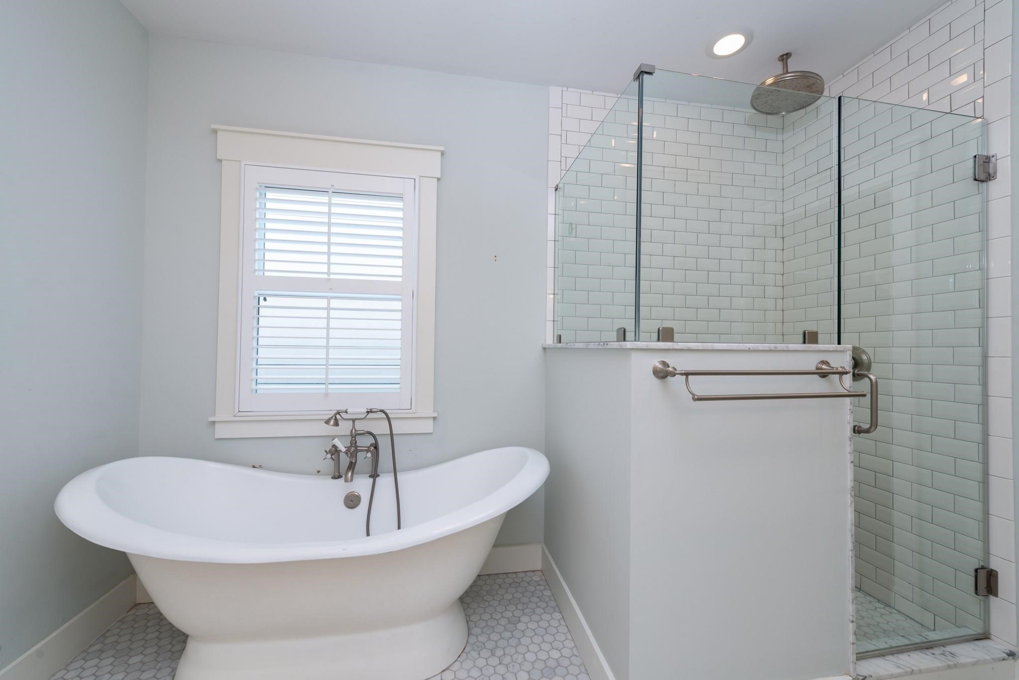 734 Allston Street, Unit B Houston, TX 77007 - Photo 15 of 28 The separate tub and shower. This tub would be great to just soak in and relax.