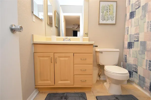 an aerial view of residential houses with outdoor space and river