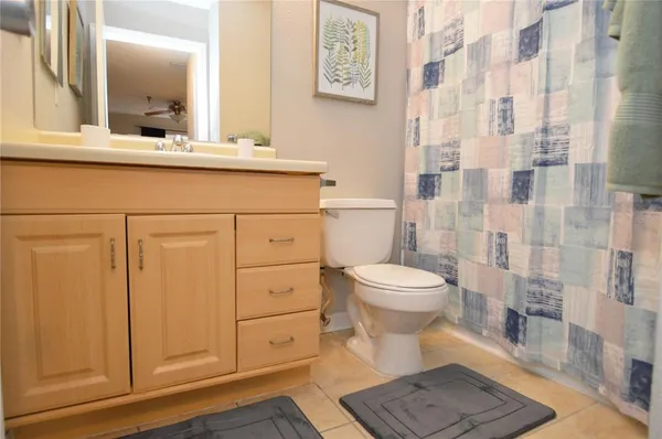 an aerial view of a house with outdoor space pool seating area and yard