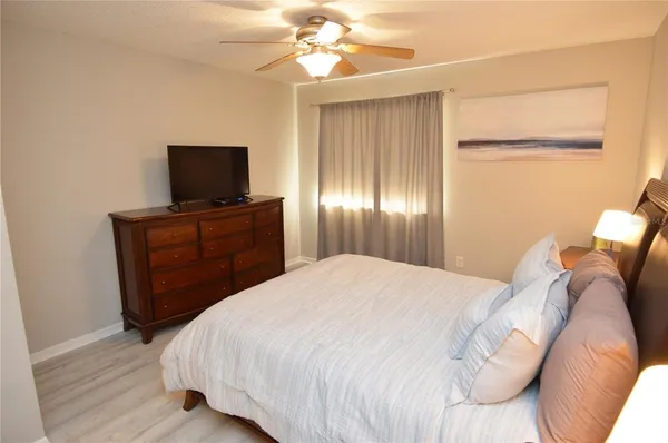 a view of a lobby with furniture and floor to ceiling window
