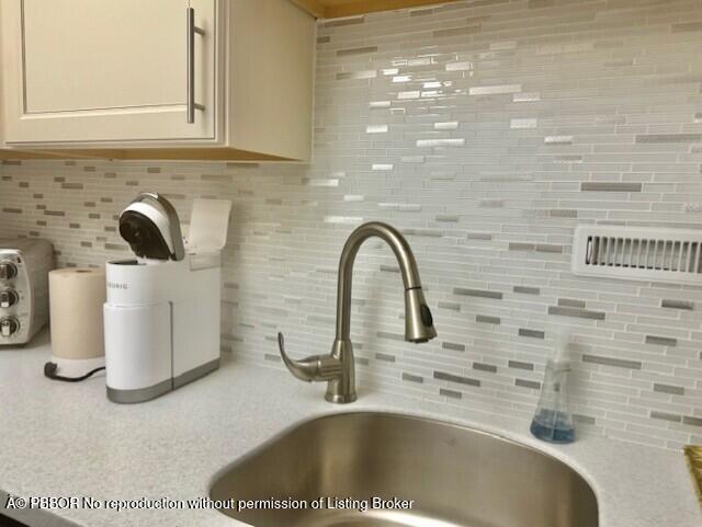 2840 South Ocean Boulevard, Unit 3170 Palm Beach, FL 33480 - Photo 11 of 30 a close view of sink and tap