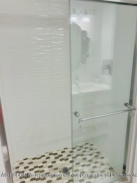 2840 South Ocean Boulevard, Unit 3170 Palm Beach, FL 33480 - Photo 20 of 30 a bathroom with a shower