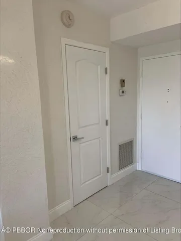 a view of balcony with furniture