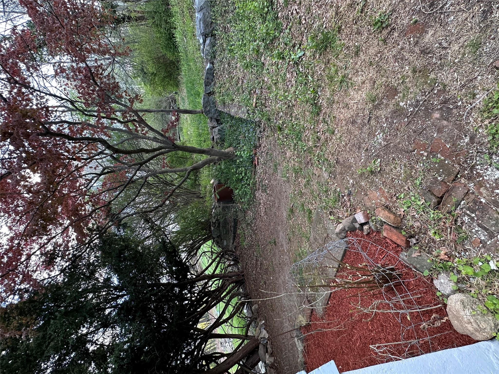 6 Pavilion Road Suffern, NY 10901 - Photo 5 of 13 a view of a backyard with trees
