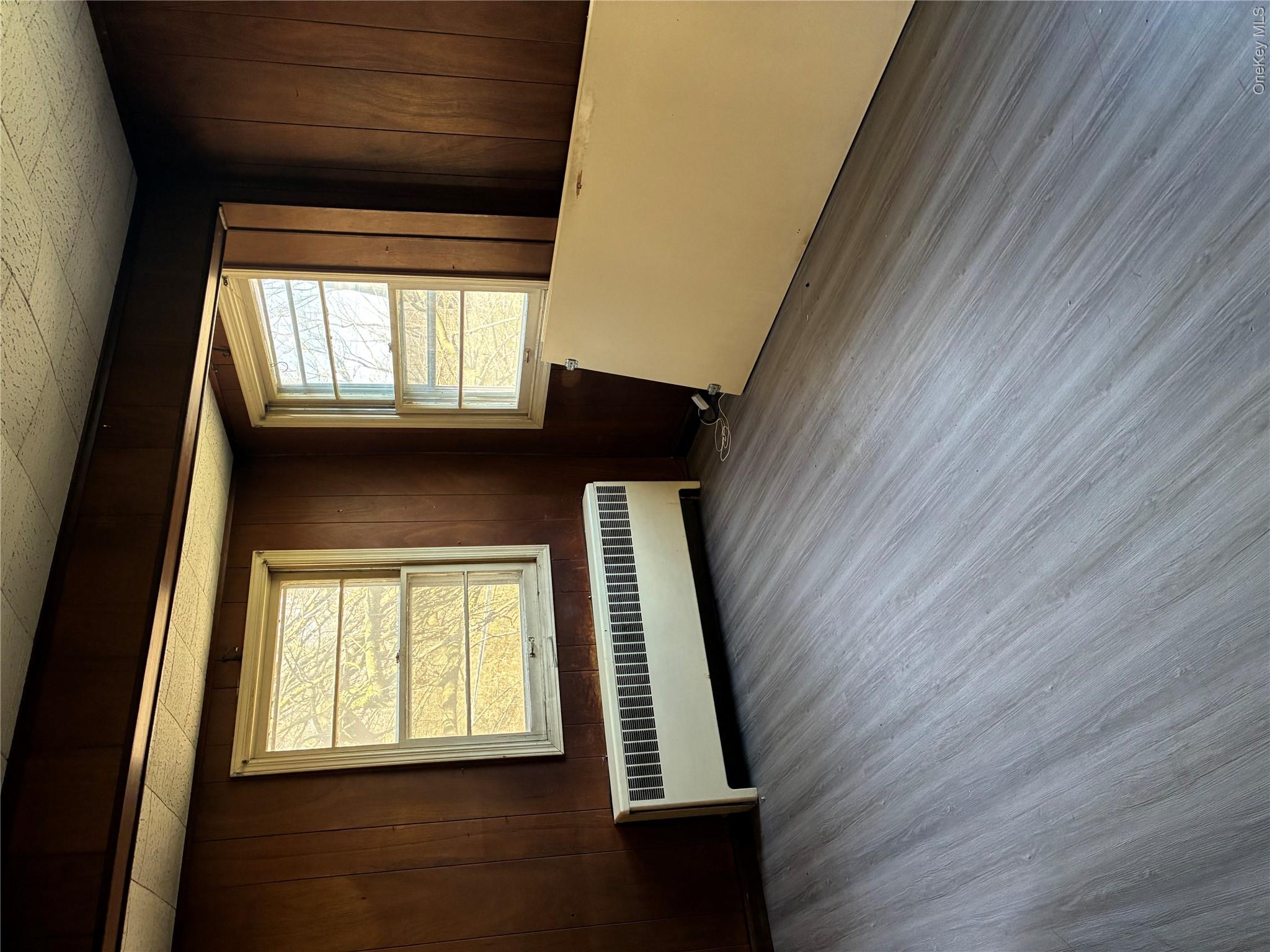 6 Pavilion Road Suffern, NY 10901 - Photo 7 of 13 a view of a room with wooden floor and a window