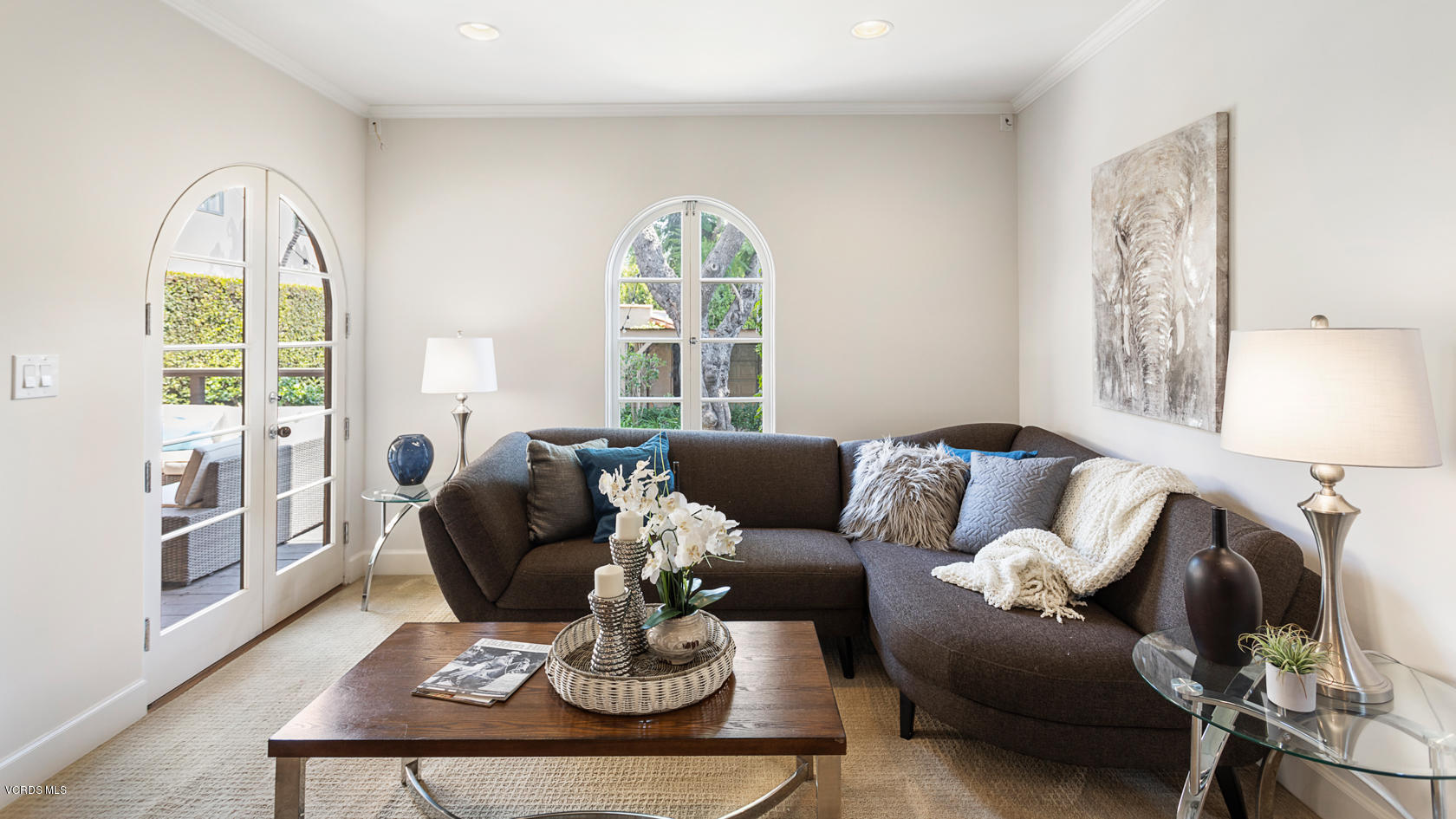 12252 Gorham Avenue Los Angeles, CA 90049 - Photo 13 of 59 a living room with furniture a window and a dining table