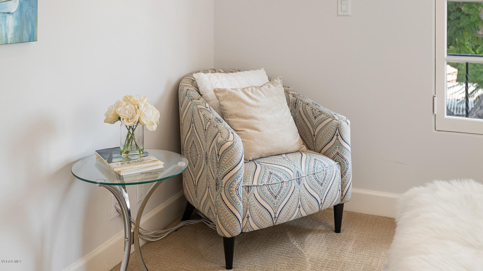 12252 Gorham Avenue Los Angeles, CA 90049 - Photo 41 of 59 a bedroom with a bed and a chandelier