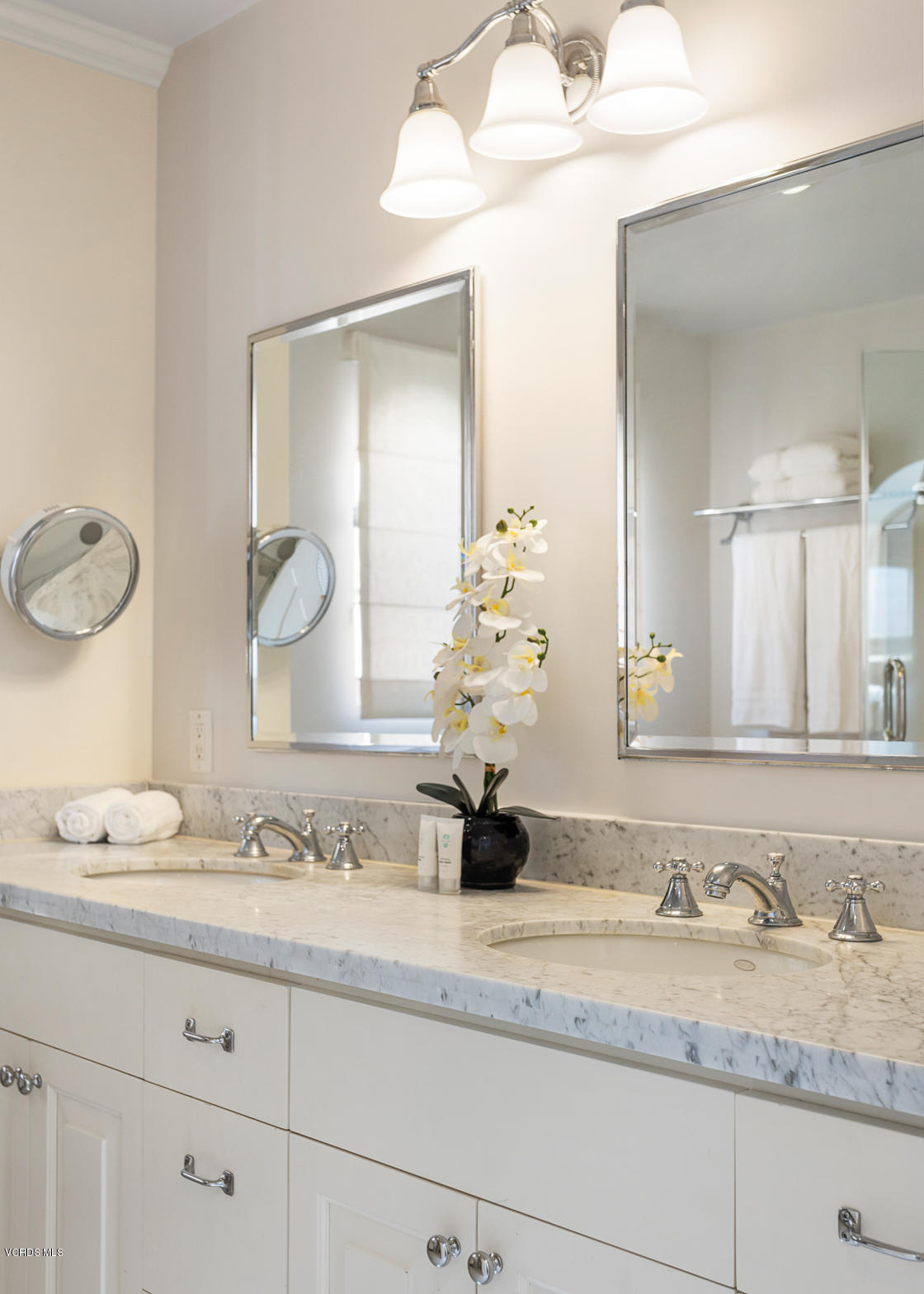 12252 Gorham Avenue Los Angeles, CA 90049 - Photo 48 of 59 a bathroom with a granite countertop sink and a mirror