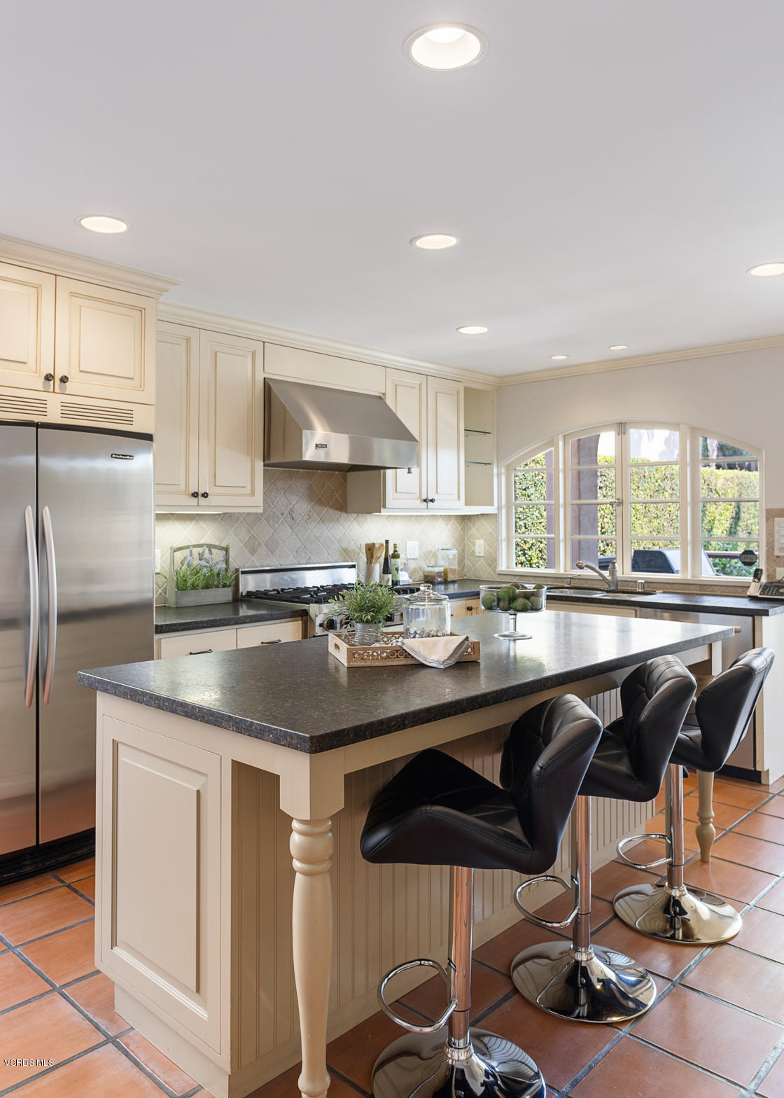 12252 Gorham Avenue Los Angeles, CA 90049 - Photo 50 of 59 a kitchen with stainless steel appliances granite countertop a sink and a refrigerator