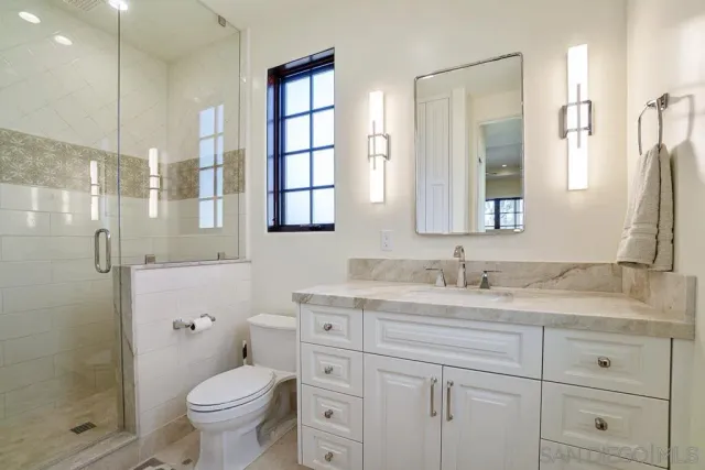 a view of a hallway with entryway door