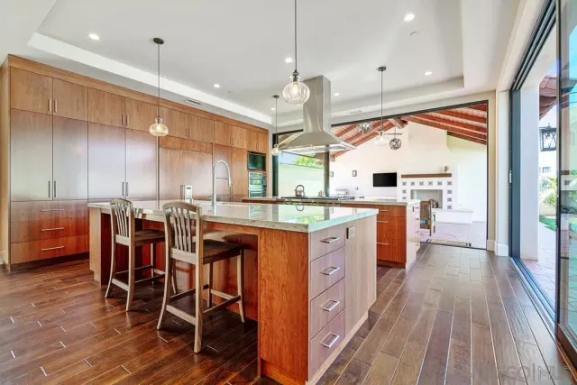 a bathroom with a shower a toilet and a tub