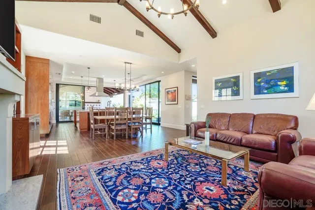 view of living room with wooden floor and flat screen tv