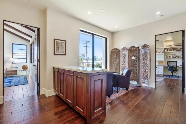 a view of a house with a fountain and a fountain