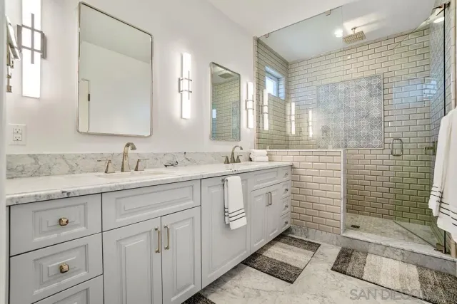 a front view of a house with a fountain